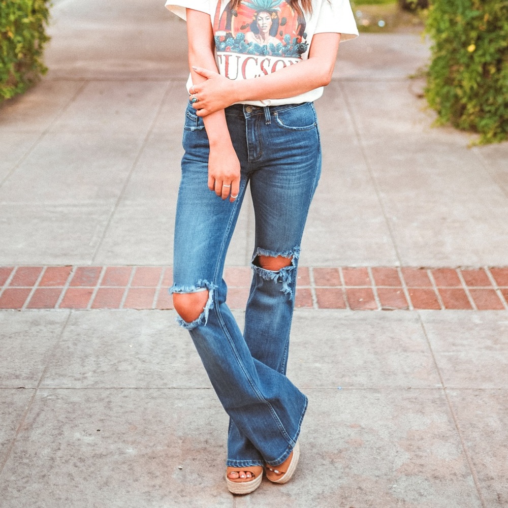 Flare jeans with knee hole